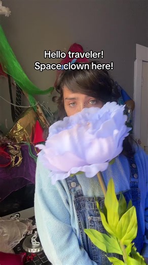 I hope you’ll join my kingdom of dreams and take the giant flower! Welcome all monarchs!! 🩵👑🛸⭐️ #singersongwriter #popmusician #upcomingartist #clown #clowns