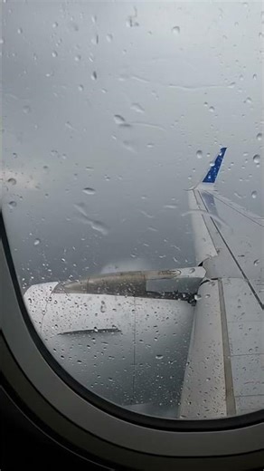 Stormy skies, smooth landing ✈️🌩️ — window seat wing view magic #Aviation #WindowSeat #RainyLanding