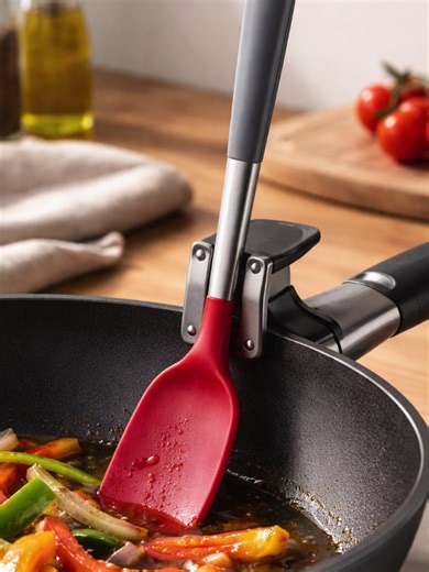 Ideas don’t change the world — execution does. Today I’m introducing FlipMate Aegis™, a small innovation designed to solve a problem millions of cooks deal with every day but rarely question: where does the utensil go while you’re cooking? Traditional spoon rests create clutter, break workflow, and increase cross-contamination. FlipMate Aegis™ rethinks the system entirely by turning the pan itself into an active workstation — a rim-mounted utensil docking solution that keeps tools upright, clean