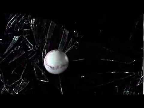 Baseball Slow Motion Impact Breaks Glass as Ball Throw Hits and Shattered Pane in an HD Video View