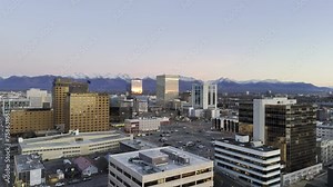 Downtown Anchorage, Alaska at twilight - Aerial HDR 4K drone footage flying forward after sunset towards buildings in downtown Anchorage