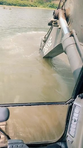 Breaking Rocks with Deere Backhoe Loader and Hammer