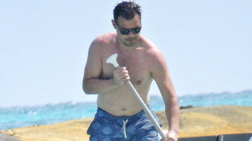 Taylor Lautner goes shirtless while enjoying beach day years after Twilight fame