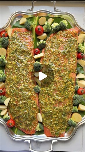 Husen Fayad on Instagram‎: "OVEN-BAKED SALMON 🤩 سلمون مشوي بالفرن Ingredients : 3,5 kg whole salmon 150g Baby potatoes 150g broccoli 100g tomatoes 100g asparagus 50g sweet pepper 50g baby corn Salt + pepper Rosemary Scallions for decoration For the sauce : 5 cloves of minced garlic 5 slices ginger 15g parsley 15g thyme 1 orange juice +grated peel) 1 lime (grated peel) 2 spoons of honey 2 teaspoons mustard 100g olive oil salt and pepper to taste #salmon #bakedsalmon #fish #paris #lebanon #chef #