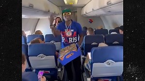 Flavor Flav Works as Attendant on Southwest Flight, Hands Out Snacks