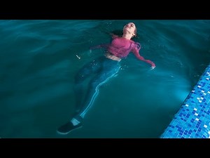 WET STYLE: A BEAUTIFUL LERA IN A WET GRAY TRACKSUIT SWIMS IN THE POOL [WETLOOKER ID: b52-lera7]