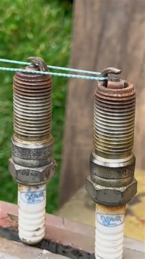 One way and tutorial for installing a rubber on a spark plug#shorts #trending #youtubeshorts #viral