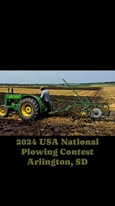 Open Class competitor plowing the “shallow” pass of his plot using a John Deere AR and John Deere 4B plow. The shallow pass is plowed shallower than normal plowing depth and leaves one furrow width left to set up the final pass where the dead furrow is created. The 2024 USA National Plowing Contest was held near Arlington, South Dakota. #antiquetractortok #antiquetractor #plowing #moldboardplowing #farming #agriculture #vintagetractor | USA Plowing Organization