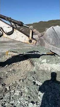 Caterpillar Excavator Loading Trucks On A Double Bench!