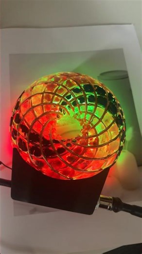Experience the 5-inch Rodin Coil with built-in rotating lights