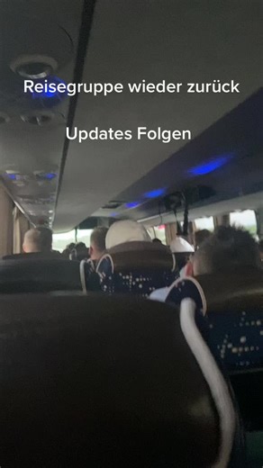 Diverse Passengers Enjoying Daytime Bus Journey