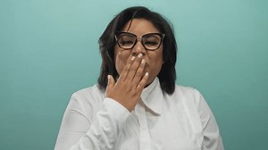 Woman Blowing Kiss Playful Manner Against Stock Footage Video (100% Royalty-free) 3802813609 | Shutterstock