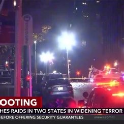 FBI launches raids in two states in widening terror probe