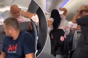 Airplane freakout: Woman hits man for staring at other women