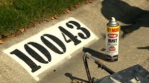 House numbers on the curb made with reflective paint could help in emergencies