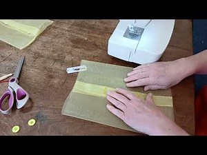 Buttoned sheer pouch