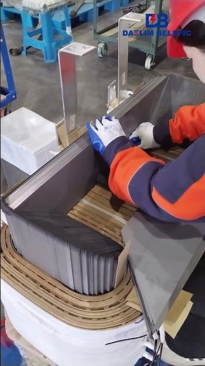 Assembling the Upper Yoke with Silicon Steel Laminations