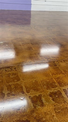 3.9K views · 79 reactions | Thought maybe a video would show the floor the best and give you all an idea of what we have done! “Three weeks to remove vct tile, grind/remove the adhesives, and then grind using multiple grits while making multiple passes to profile that old concrete slab!” Then we began installing (4300sqft) of stained epoxy flooring with absolutely no repairs done to the concrete! Raw and Rustic… | Advanced Epoxy | Facebook