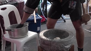 Traditional Japanese Sweet Mochi Making with an Old-Style Mochi Pounding Machine.