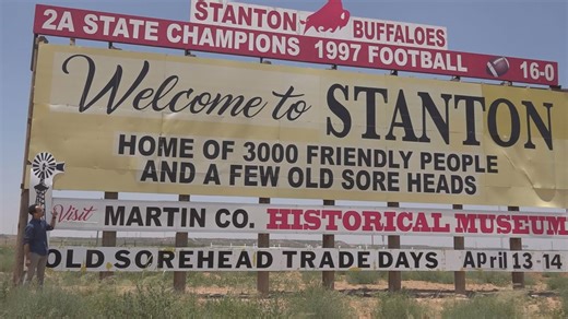'Home of 3,000 Friendly People and a few old Sore Heads' | The story behind the larger-than-life signs in Stanton