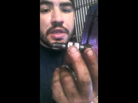 Spark plug thread repair and clearing threads