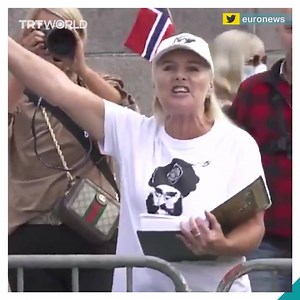 At an anti-Islam protest in Oslo, Norway, a protester tears pages out of the Quran and spits on them. | Dar Basim