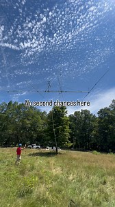 That’s a lot of antenna moving through the air. About 50 feet long, roughly 200 pounds, riding the tram line clean and balanced. This is what scale actually looks like before it ever reaches the tower. From the ground it feels slow. In the air, everything matters. #antenna #hamradio #engineering #infrastructure #rigging | VCTowers