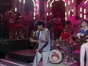 Drop The Pilot is one of the most famous and commercially successful songs by English singer-songwriter Joan Armatrading. Released in 1983, the track stands out for its upbeat, energetic Pop/Rock rhythm and modern, polished 80s production. The lyrics are a bold, confident, and direct proposition in love: "Drop the pilot, come out with me," using the imagery of a "pilot" and a "captain" as a clever metaphor for a romantic partner. (Songwriter): Joan Armatrading (Music and Lyrics). (Year Written):