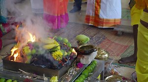 Offering at fire altar at Indian temple