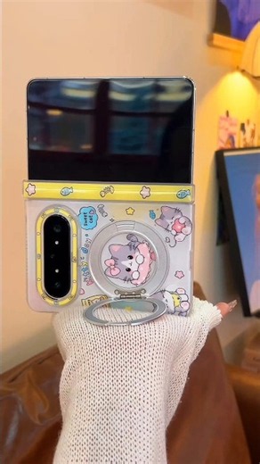 The cutest hello kitty iPhone Fold case ever!! 🐱💛