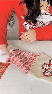 Create a whimsical DIY Dollar Tree elf stocking by cutting and gluing several stockings together, then add festive touches to make it uniquely yours for Christmas! 🎄🧝‍♂️✨ | Olivia's Romantic Home DIY