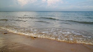 Waves breaking after rainfall - Free Stock Video