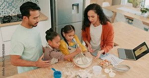 Laptop, bowl and a family baking in the kitchen together with parents teaching their girl children about food. Computer, love or recipe with kids learning how to cook from a mother and father