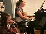 Myleene Klass plays piano while daughters join in on cello