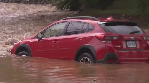 Deadly storms batter the Northeast and cause severe flash flooding, submerging cars and prompting water rescues