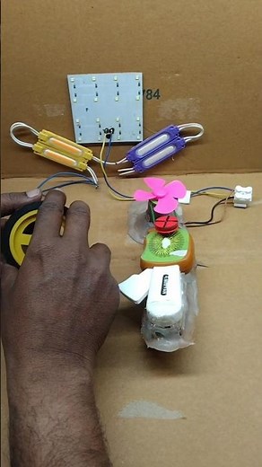 How I powered a 12-volt LED light and fan using a dynamo motor. #dc dynamo motor #electricity