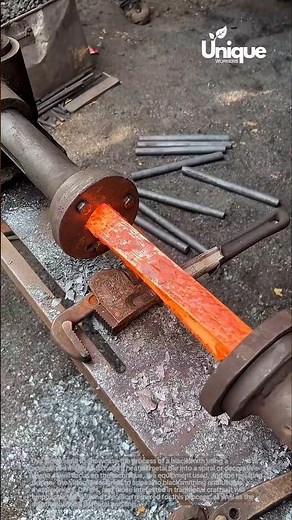 Blacksmithing: twisting a metal bar with a machine
