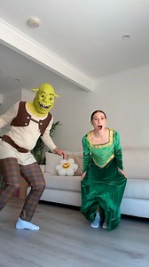 What are you doing in my swamp? 😂💚 We finally did the Shrek dance! 6 more videos in these costumes up now on our YouTube channel! 🫶🏼😜 Day 1 of 31 days of costumes complete ✅ #shrek #costume #couple #dance #dancers #reels #viral | Jasmin and James