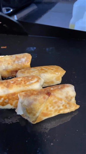 Here’s another simple dinner idea, taco egg rolls on the Pit Boss Griddle! We use a shallow fry to cook the egg rolls after browning our ground beef, adding taco seasoning and copious amounts of cheese! #pitbossnation #griddlecooking #howtocook #simpledinner | WALTWINS