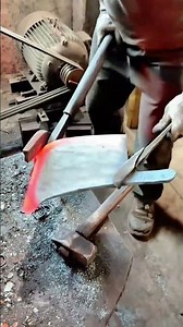 Precision Forging Process of a Heavy Duty Steel Axe Head in a Workshop