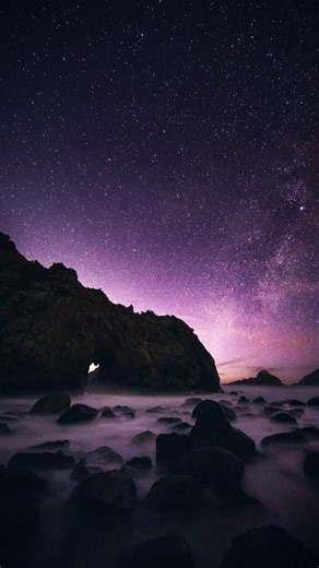 Dawn Marie Dunlap on Instagram: "The Big Sur Keyhole Arch phenomenon is one of the most magical sights on the entire California coast and it only happens a few weeks each January. When the sun lines up perfectly with the natural sea arch at Pfeiffer Beach, the whole shoreline glows gold and the purple sand looks unreal. And here’s the part most people miss: 👉 after the crowds leave, the beach goes dark and the stars come alive above the arch. It’s one of the rare places in Big Sur where you can