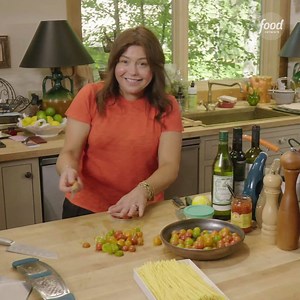 74K views · 854 reactions | Use your storage container lids to make cutting cherry tomatoes so much easier! If you're not as excited as Rachael Ray about this, you better get on her level  See how Rachael puts these tomatoes to use in the latest episode of #30MinuteMeals on the #FoodNetworkKitchen app: https://food-network.app.link/PBsocLxuM9! | Food Network Kitchen | Facebook