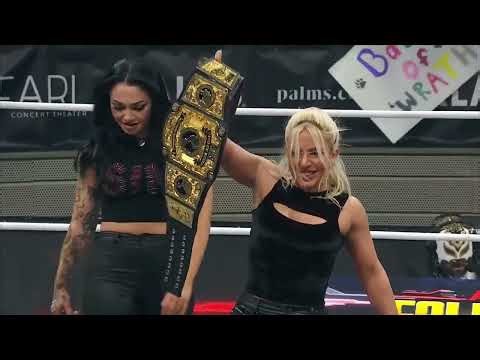 Thekla victory pose on Kris Statlander