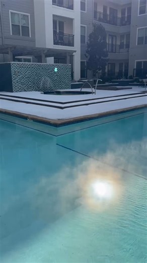55+ Plano Apartments on Instagram: "While the storm rolls in ❄️, we’re staying warm 🔥 Enjoy our steamy heated pool at Overture Plano#activeadult #greystarliving #seniorlivingcommunity"