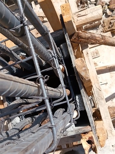 Inserting Spacer Blocks for Concrete Cover in Construction