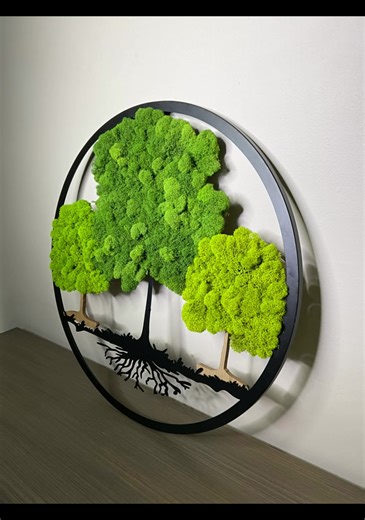 Three trees. Three moss colors. One cohesive design. This is not ordinary décor. It is a set of three handcrafted preserved moss trees created to bring calm, texture, and modern elegance into your space. Each tree features a different moss color, forming a balanced and visually striking composition. The combination of metal and wood gives them a timeless, refined look. Tree height 26 inches Designed for indoor spaces No watering and no maintenance Each piece is handmade and one of a kind Perfect