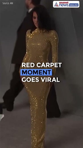 Kim Kardashian Dazzles in Gold at Vanity Fair Oscar Party Red Carpet