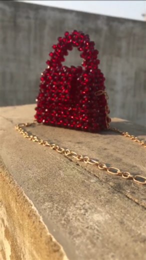 HuzamBySA on Instagram: ". Ruby Bold is here to steal the spotlight🔥 ✨ New drop out! ✨ Introducing “Ruby Bold” — a crystal-studded mini beaded bag crafted to steal the spotlight this wedding season. Handmade with maroon beads that will glow in every Baraat & Valima.❤️✨ Mini Beaded Bag Dimensions: Height: 7 cm Length: 9 cm Width: 3 cm Why you’ll love it: 💫 – Sparkles beautifully in every event – Handcrafted with precision – Adds instant festive glam to any outfit Ideal for wedding guests, and e