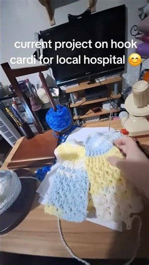 making baby cardigans for my donations box to go to local hospitals and preschools