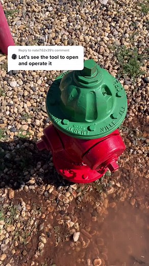Fireman Demonstrates Using a Hydrant Wrench
